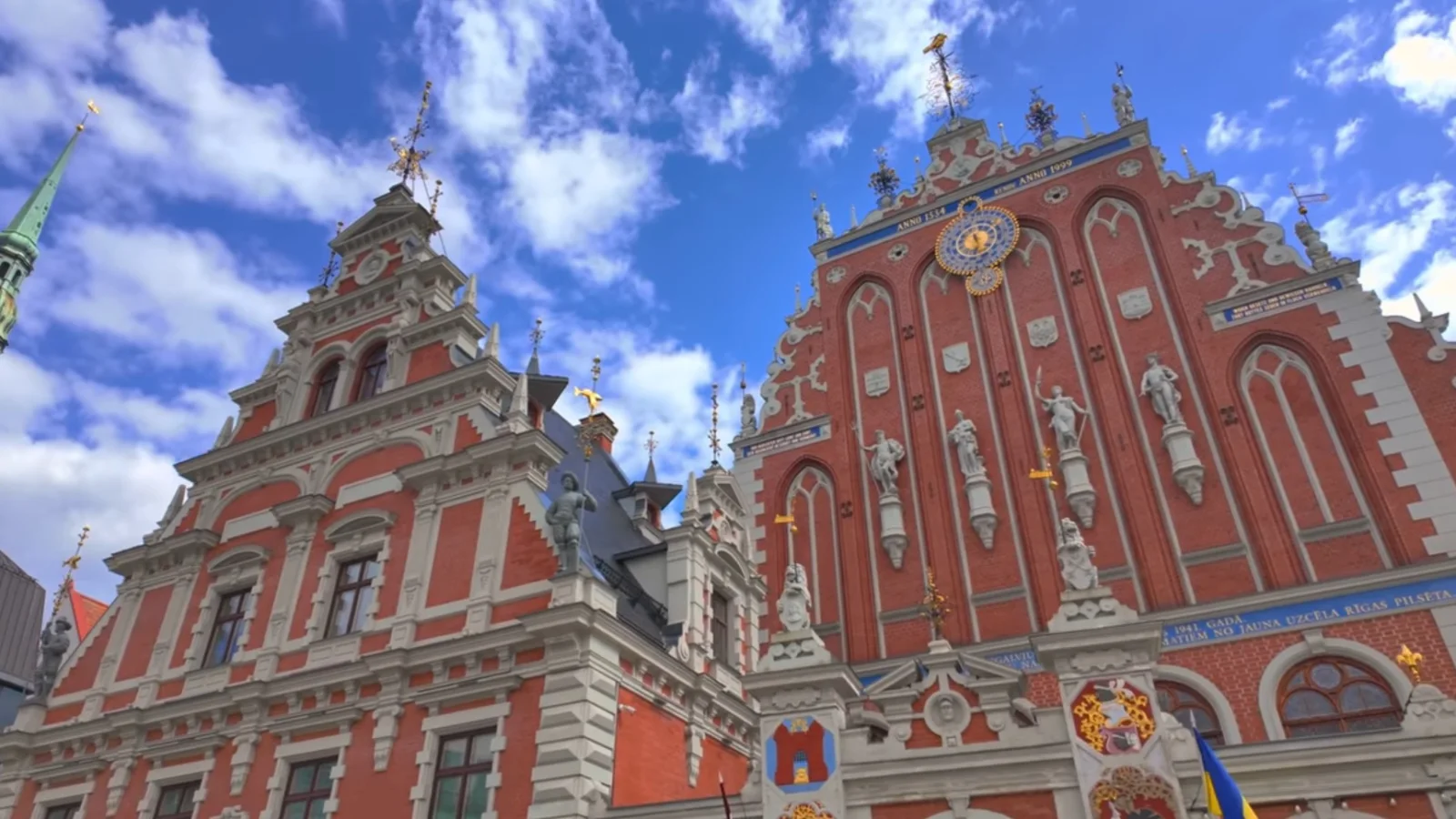 House of the Black Heads in Riga Town Hall Square beneath a blue sky